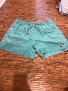 Saxx Men's Teal Swim Trunks
OH BUOY 2N1
Size: XL